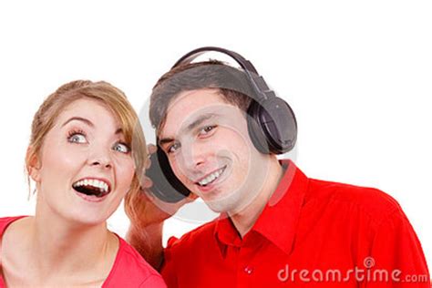 Couple Two Friends With Headphones Listening To Music Stock Photo