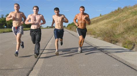 Group Of Runners Men Jogging At Highway Male Sport Athletes Training Outdoor Sports
