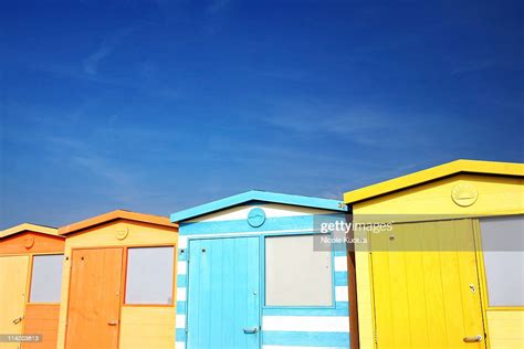 Classic Colorful English Beach Huts In Seaford High Res Stock Photo