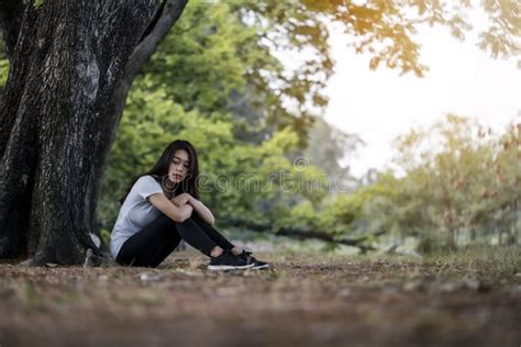 Depressed Teenage Girl Sitting Alone Stock Photo Image Of Happy Cute
