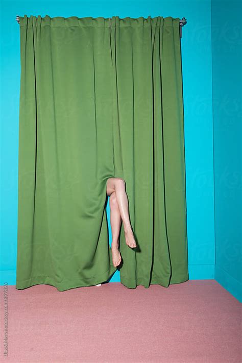Legs Of A Lady Hiding Behind The Curtain In A Room By Ula And Merve