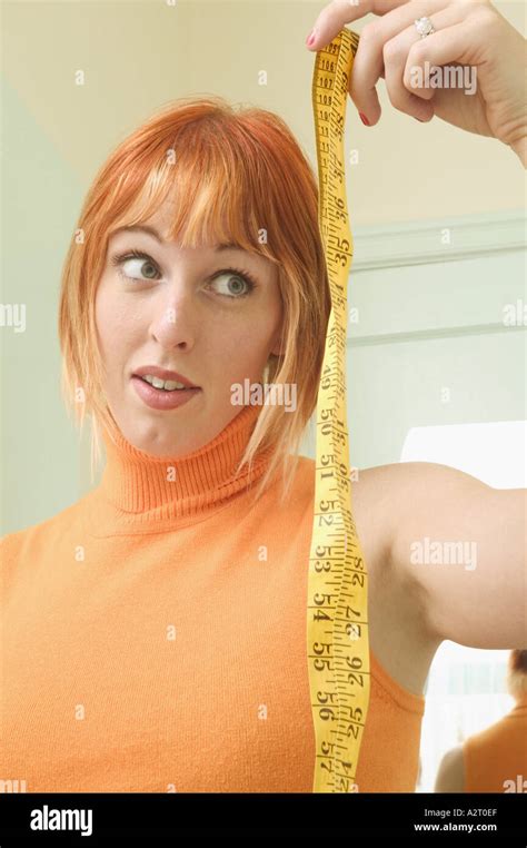Measuring Tape And Young Woman Stock Photo Alamy