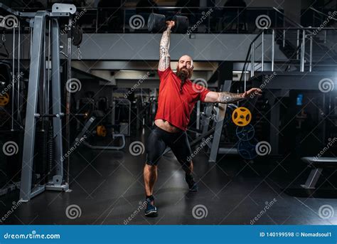 Strong Weightlifter With Dumbbells Workout In Gym Stock Photo Image