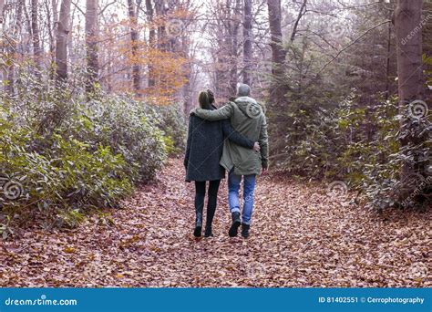 Couple Walking In The Forest Stock Image Image Of Hand Path 81402551