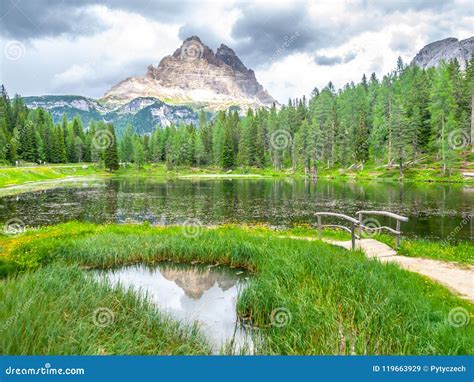 Tre Cime Di Lavaredo Mountain Reflected In Water Od Antorno Lake