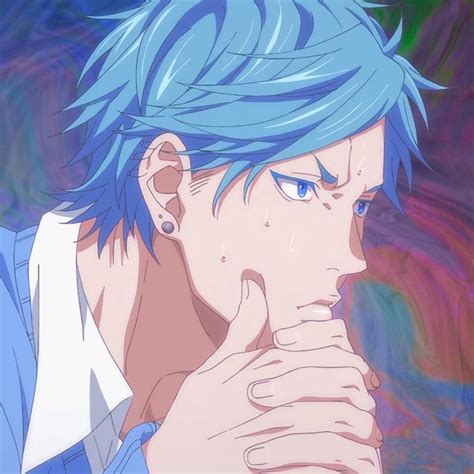 An Anime Character With Blue Hair And Piercings On His Ears Looking At