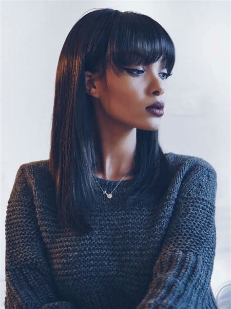 The fringe is parted sideways with most of the hair on one side. Cute Straight bob hairstyle black human hair wigs with ...