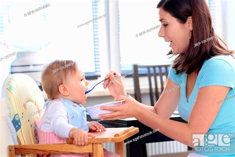 Mother Taking Care Of Her Child Stock Photo Picture And Rights