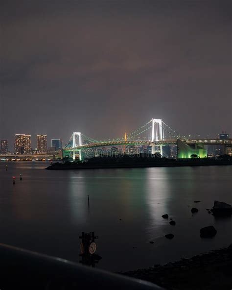 Amazing Bridge Lighting Up The Cityscape And Buildings In Tokyo Stock