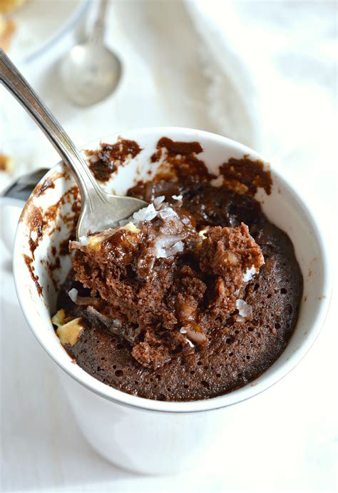 This mug cake is moist, delicious and topped with a lovely vanilla icing that soaks into the cake and infuses it with an easy vanilla mug cake perfect for one. Dairy-Free German Chocolate Mug Cake Recipe - WonkyWonderful