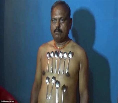 indian man who claims to be magnetic can hold a 10kg iron on his body daily mail online