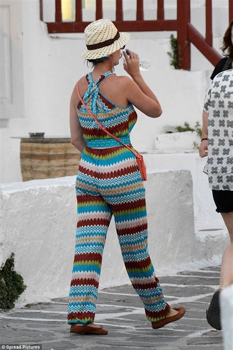 Katy Perry Opts For Wacky Holiday Fashion In A Bizarre Zig Zag Print Jumpsuit On Greek Getaway