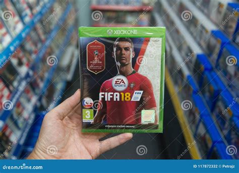 Man Holding Fifa 18 With Russia World Cup 2018 Cover Videogame On