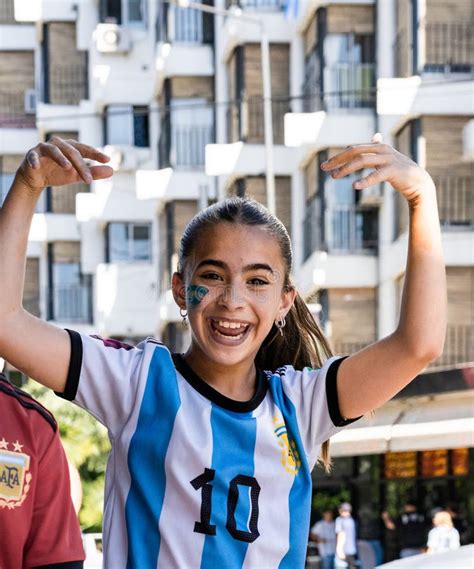A Young Girl Celebrates Argentina Winning The 2022 Fifa World Cup In
