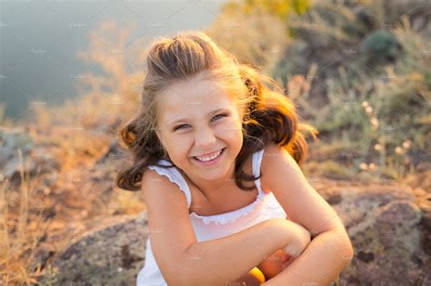 A Small Smiling Laughing Girl With C High Quality People Images ~ Creative Market