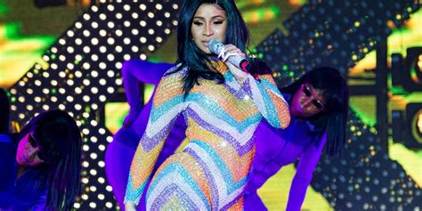 Cardi B Rips Jumpsuit From Twerking Performs In A Bathrobe At Bonnaroo