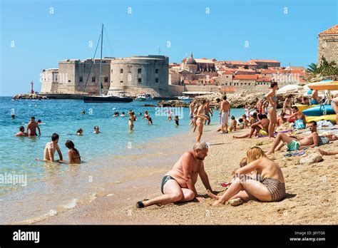 Dubrovnik Croatia August 20 2016 People On Beach At Adriatic Sea And Dubrovnik Fort