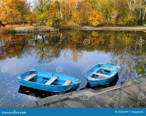 Autumn Water Landscape Two Boats On The Lake Pond Stock Photo