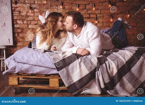 Romantic Couple Kissing In Bed Stock Image Image Of Bedroom Affection
