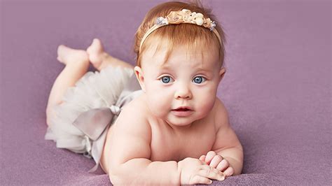 Grey Eyes Cute Girl Baby Is Lying Down On Light Purple Cloth Hd Cute