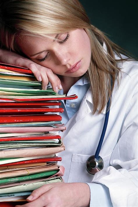 Over Worked Doctor Photograph By Mauro Fermariello Science Photo Library Fine Art America