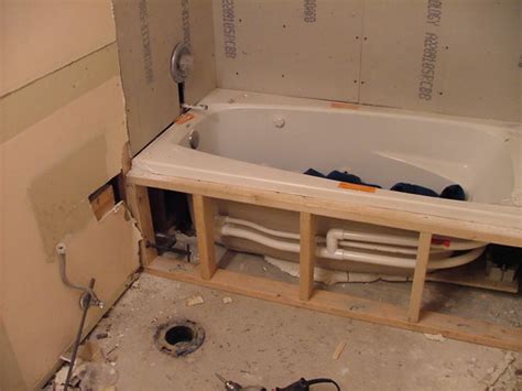 It can be more challenging to install than a traditional tub, too. Bathtub Installation (16) | Steven Goldstein | Flickr