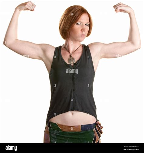 Serious Caucasian Woman Flexing Biceps Over White Background Stock