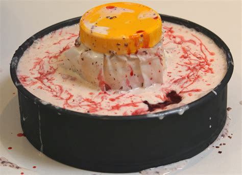This ice cream bombe, packed full of berries and dried fruit, will make a stunning dinner party centrepiece and a great option for children. Easy Christmas Ice Cream Wreath with Mixed Berries and Chocolate | Desire Empire