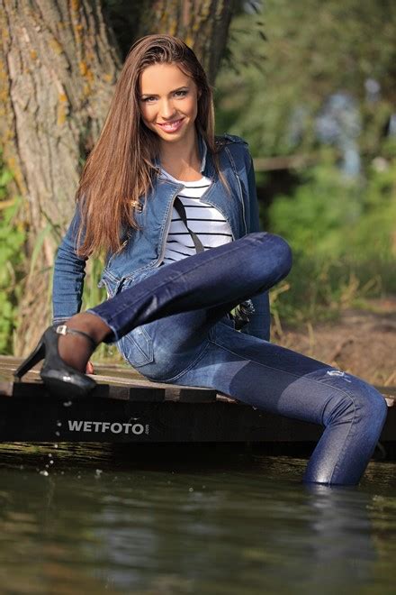 wetlook by beautiful girl in jeans denim jacket tights and high heels
