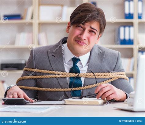 Businessman Tied Up With Rope In Office Stock Image Image Of Prisoner