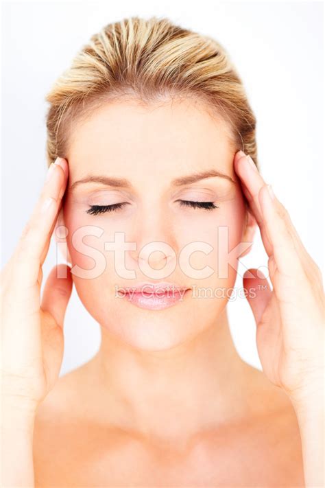 Young Woman Rubbing Her Temples Stock Photo Royalty Free Freeimages
