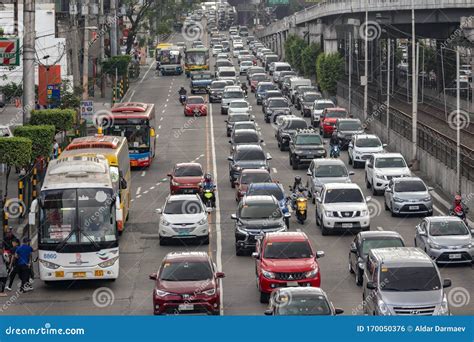 Traffic Jam With Many Cars And Buses On Dhaka City Street With Smoke