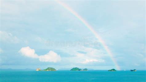 Rainbow On Sky Sea Ocean After Raining Cloudy Day Panorama Stock