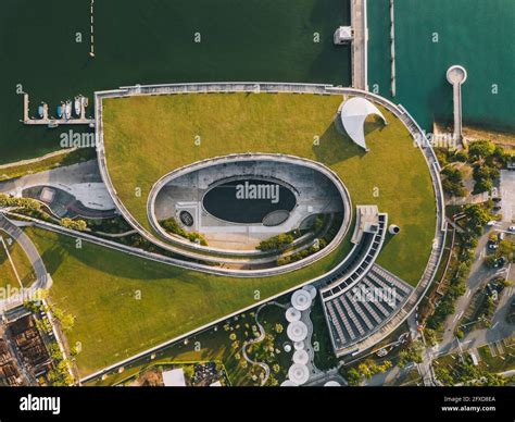 Aerial View Of The Marina Barrage Building During Sunrise Light In