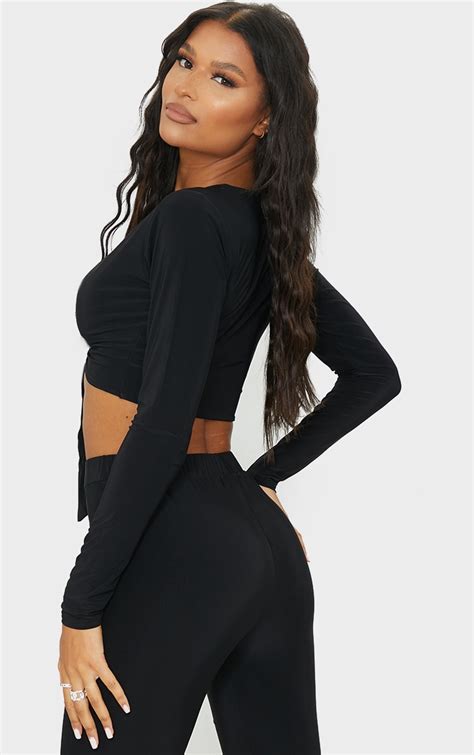 Black Slinky Long Sleeve Cut Out Tie Front Crop Top Prettylittlething