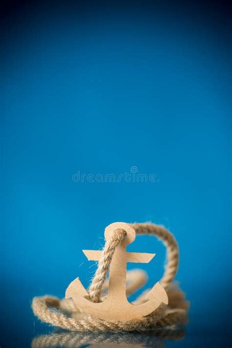 Wooden Decorative Anchor On A Blue Background Stock Photo Image Of