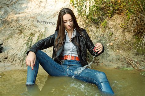 Beautiful Girl In Skinny Blue Jeans Gets Completely Wet At The Lake