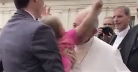 Little Girl Meets Pope Francis Before Cheekily Stealing His Hat Leaving