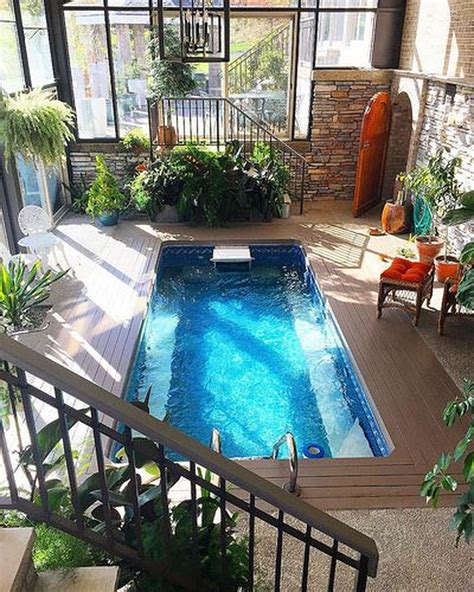 A sunspace design swimming pool enclosure can be built as an addition to your home or as a standalone enclosure. Lovely Small Indoor Pool Design Ideas 09 - MAGZHOUSE