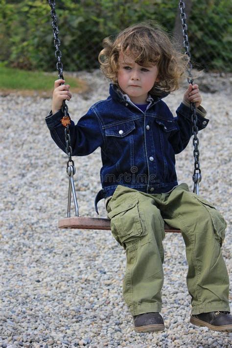 Sad Lonely Boy Sitting Swing Stock Photos Free And Royalty Free Stock