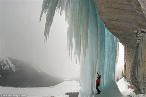 N Ice Day For A Climb Amazing Pictures Of Brave Climber Scaling 1000ft Frozen Waterfall With