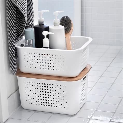 the container store nordic storage baskets with handles stylish organisers that will help