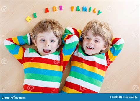 Two Little Sibling Kid Boys Having Fun Together Indoors Stock Image