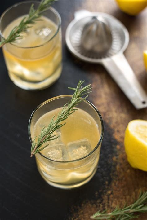 Sunny because of the orange juice. Lemon & Rosemary Bourbon Sour - Foxes Love Lemons