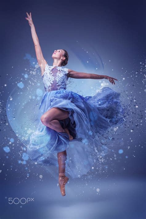 The Beautiful Ballerina Dancing In Long Blue Dress On Blue Background Dance Photography Poses