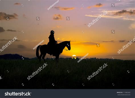 Cowboy Sitting On His Horse At Sunrise Montana Stock Photo 111682565