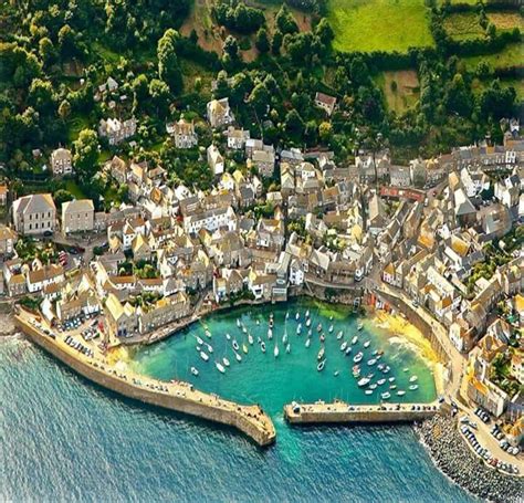 Aerial View Of The Idyllic Seaside Village Of Mousehole In Cornwall