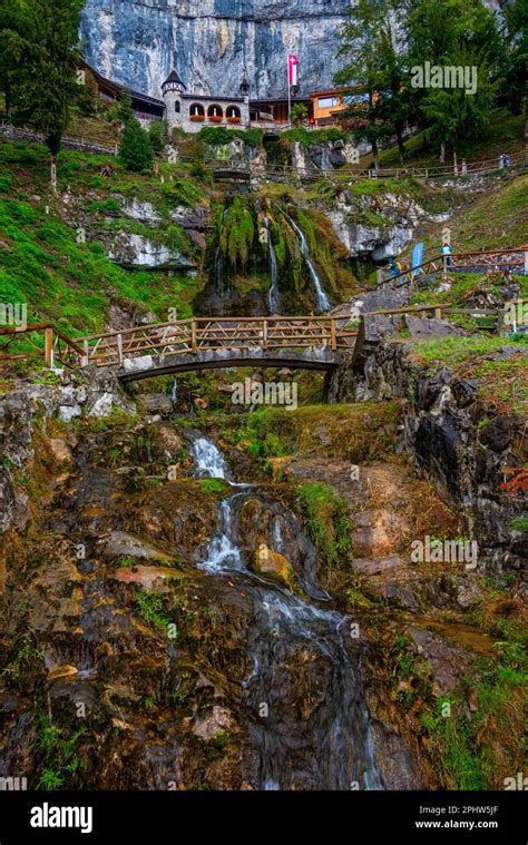 Waterfall Flowing From St Beatus Caves In Switzerland Stock Photo Alamy