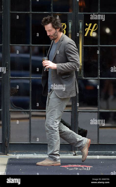 Keanu Reeves Sips An Iced Coffee In Downtown Manhattan Hi Res Stock