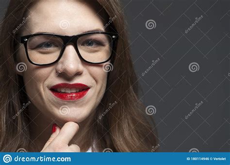Close Up Portrait Of Young Woman With Eyeglasses And Red Lips Stock